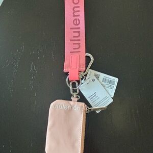 lululemon athletica pink strap keychain wallet